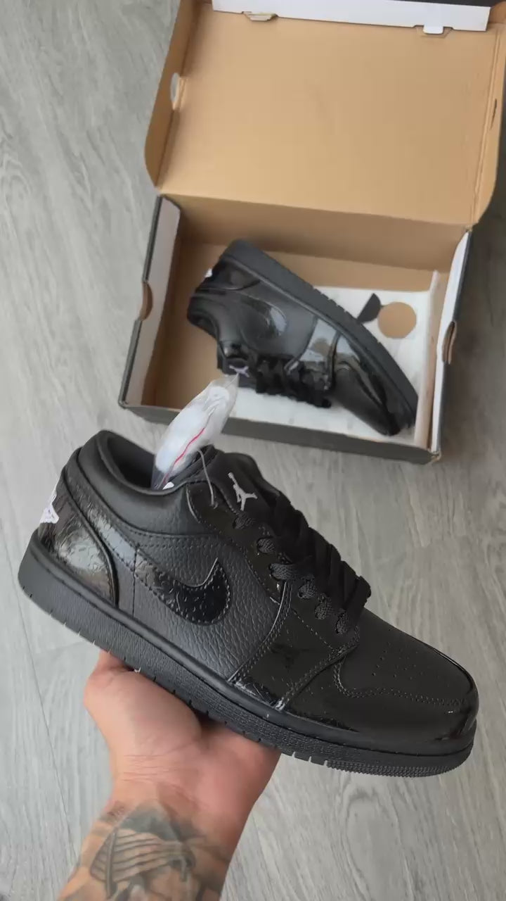 Air Jordan 1 Low Blackout – Triple Black Graphic Swoosh